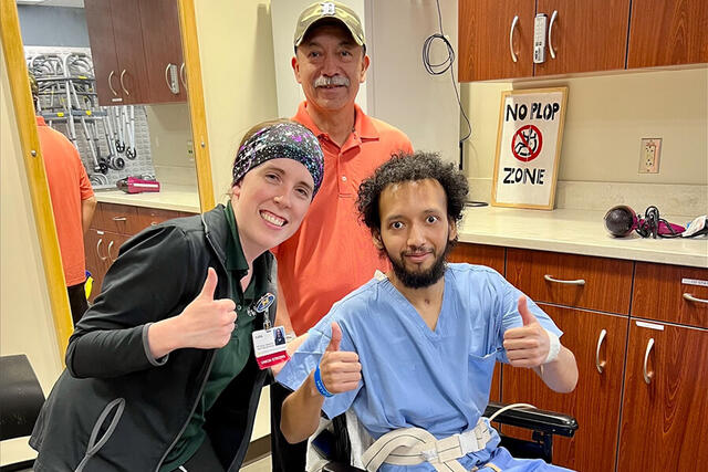 Mary Free Bed Carousel - Man in Wheelchair with Thumbs Up