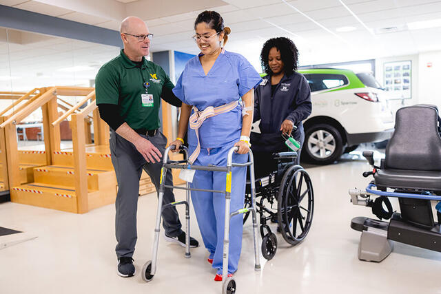 Mary Free Bed Carousel - Woman with Walker and Wheelchair 