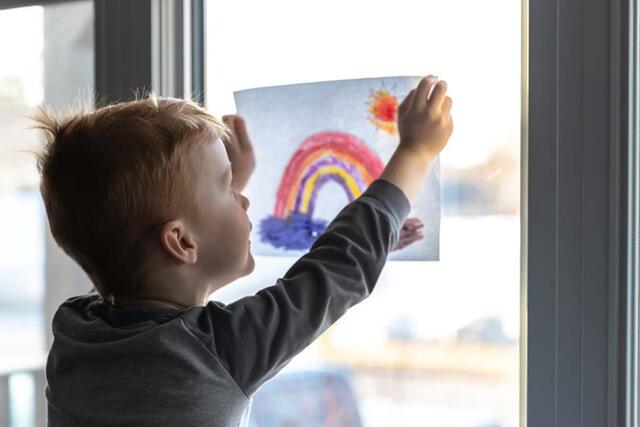 UM Health-Sparrow Pediatrics - Child with Rainbow Drawing